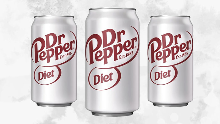 A can of Diet Dr. Pepper on a reflective surface